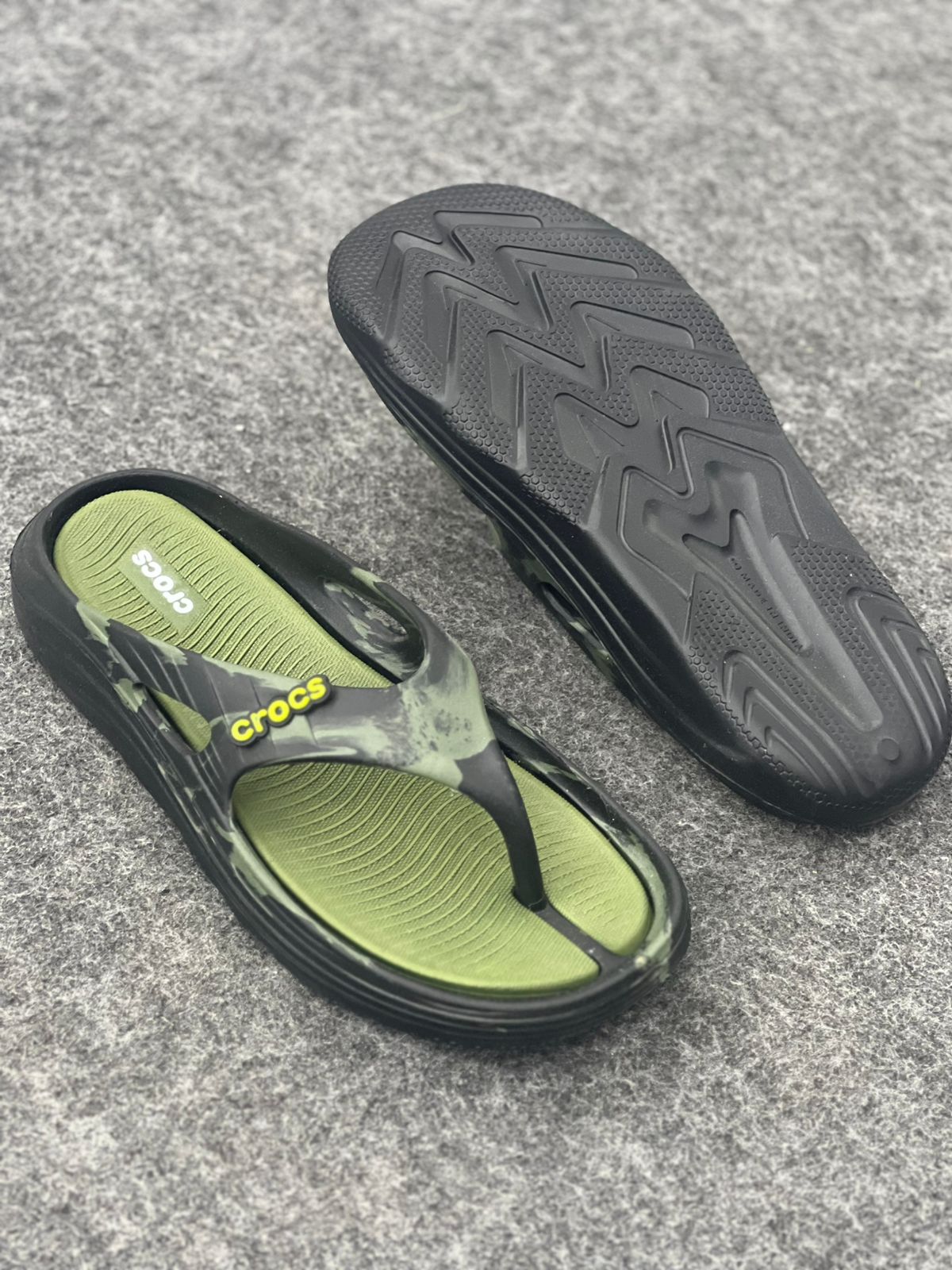 Adventure-Ready Style: Crocs Moss Green Marble Flip-Flops