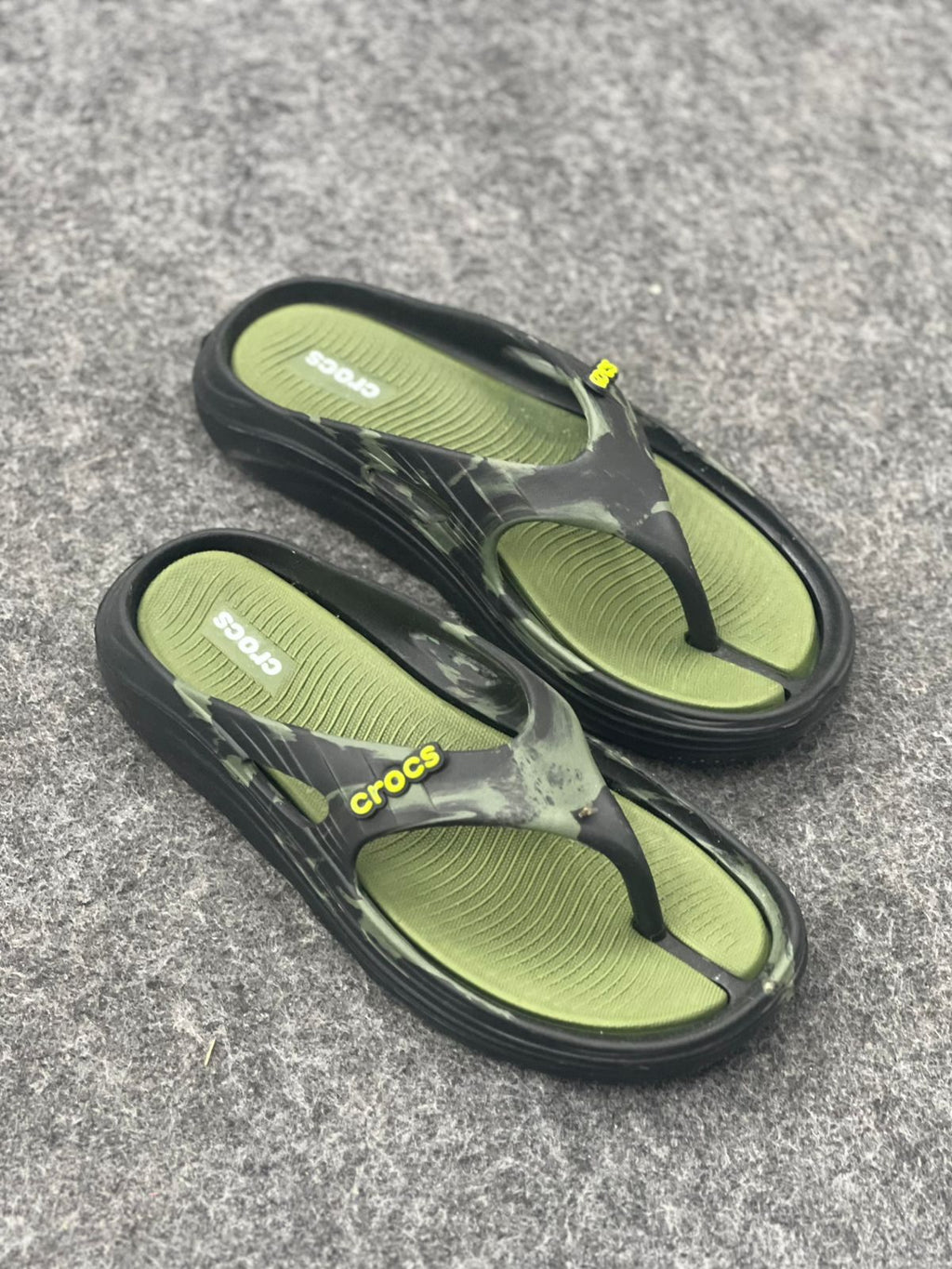 Adventure-Ready Style: Crocs Moss Green Marble Flip-Flops