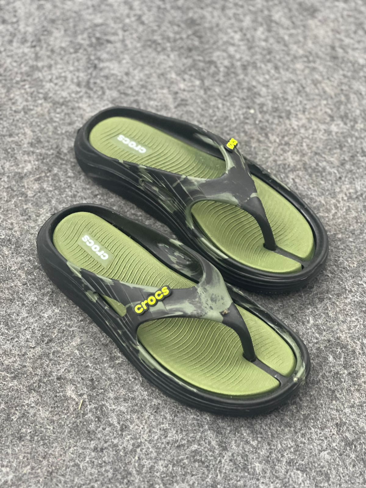 Adventure-Ready Style: Crocs Moss Green Marble Flip-Flops